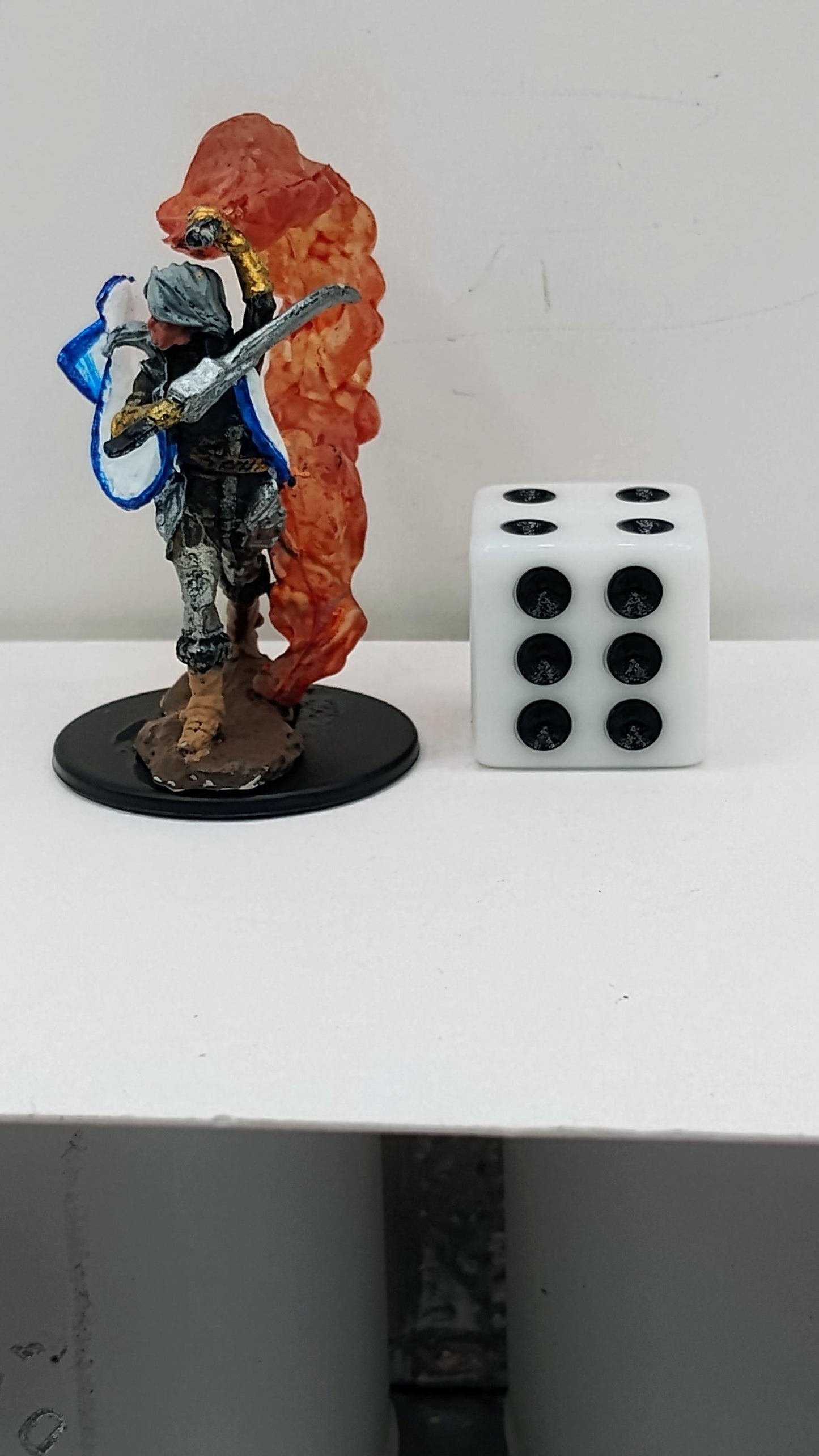 Human Cleric Miniature: Flaming Weapon, Gold Armor