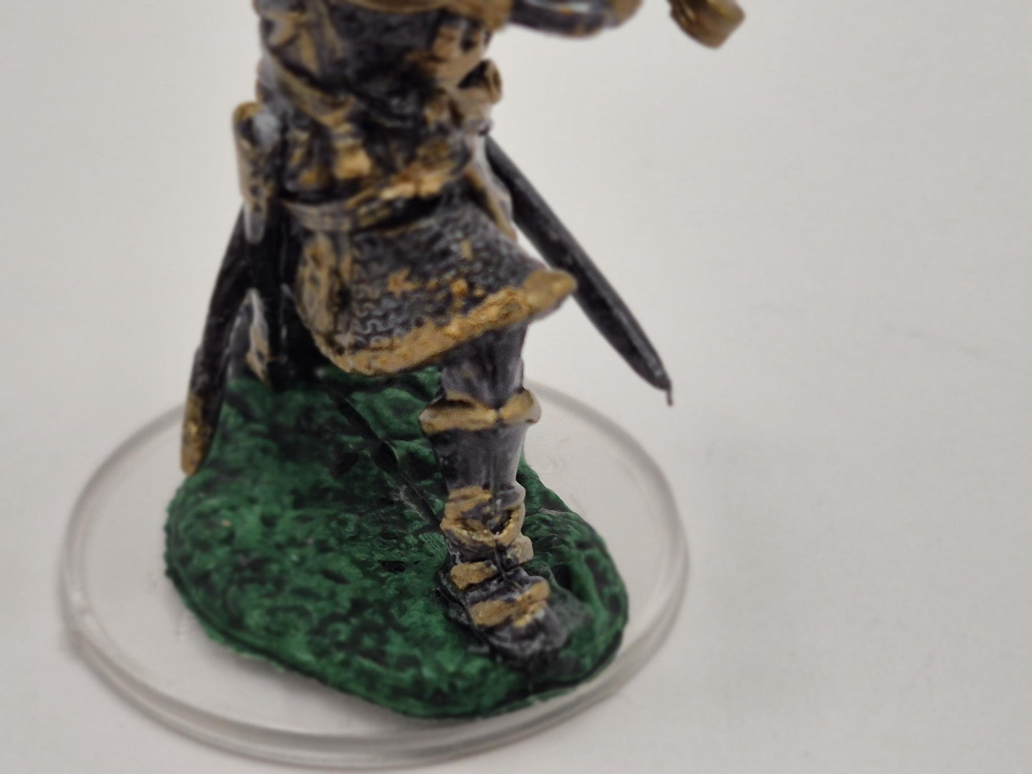Human Paladin Miniature: Gleaming Gold Armor, Sword Raised