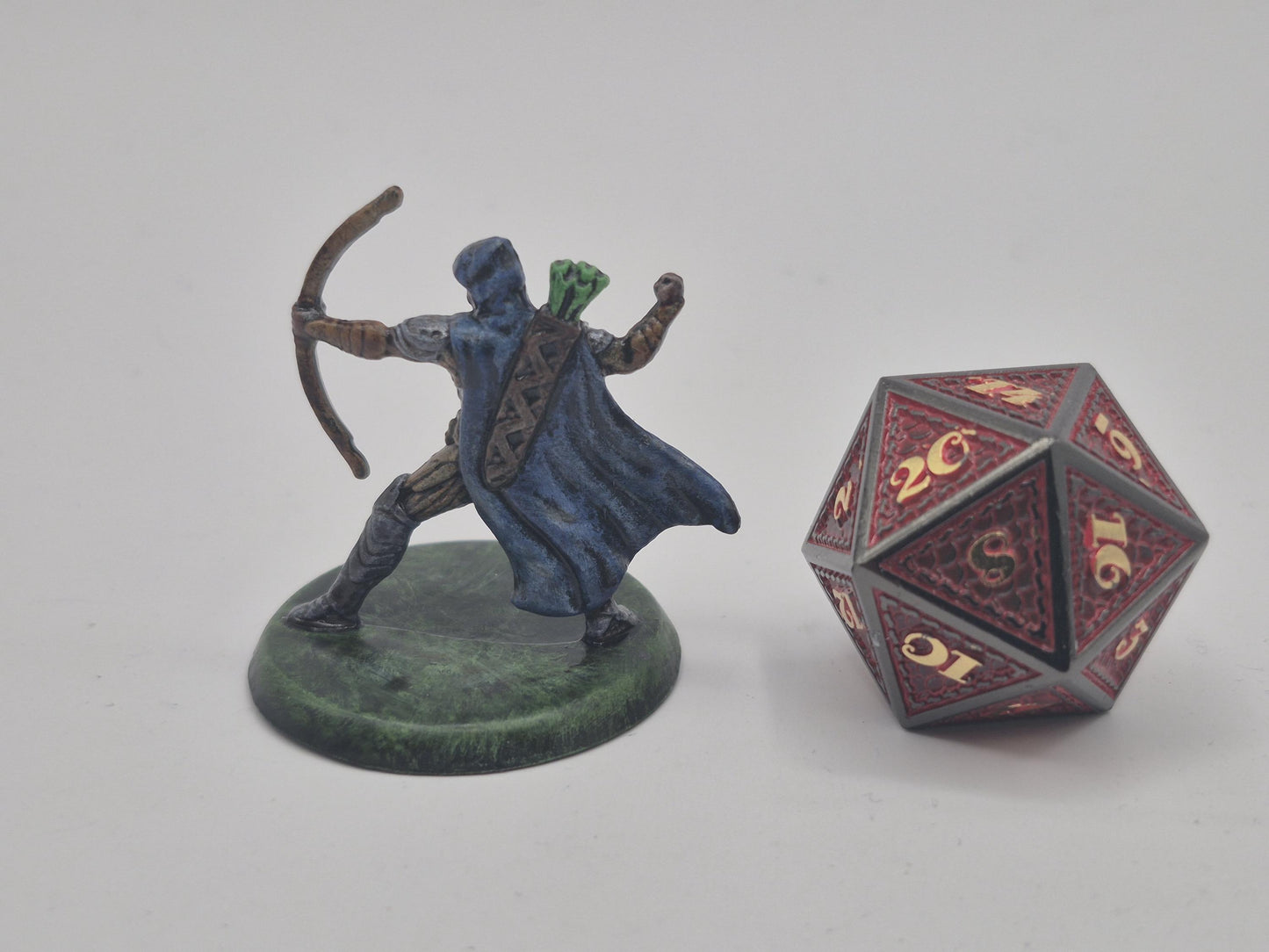 Human Archer Miniature: Gleaming Armor, Green Fletched Arrows