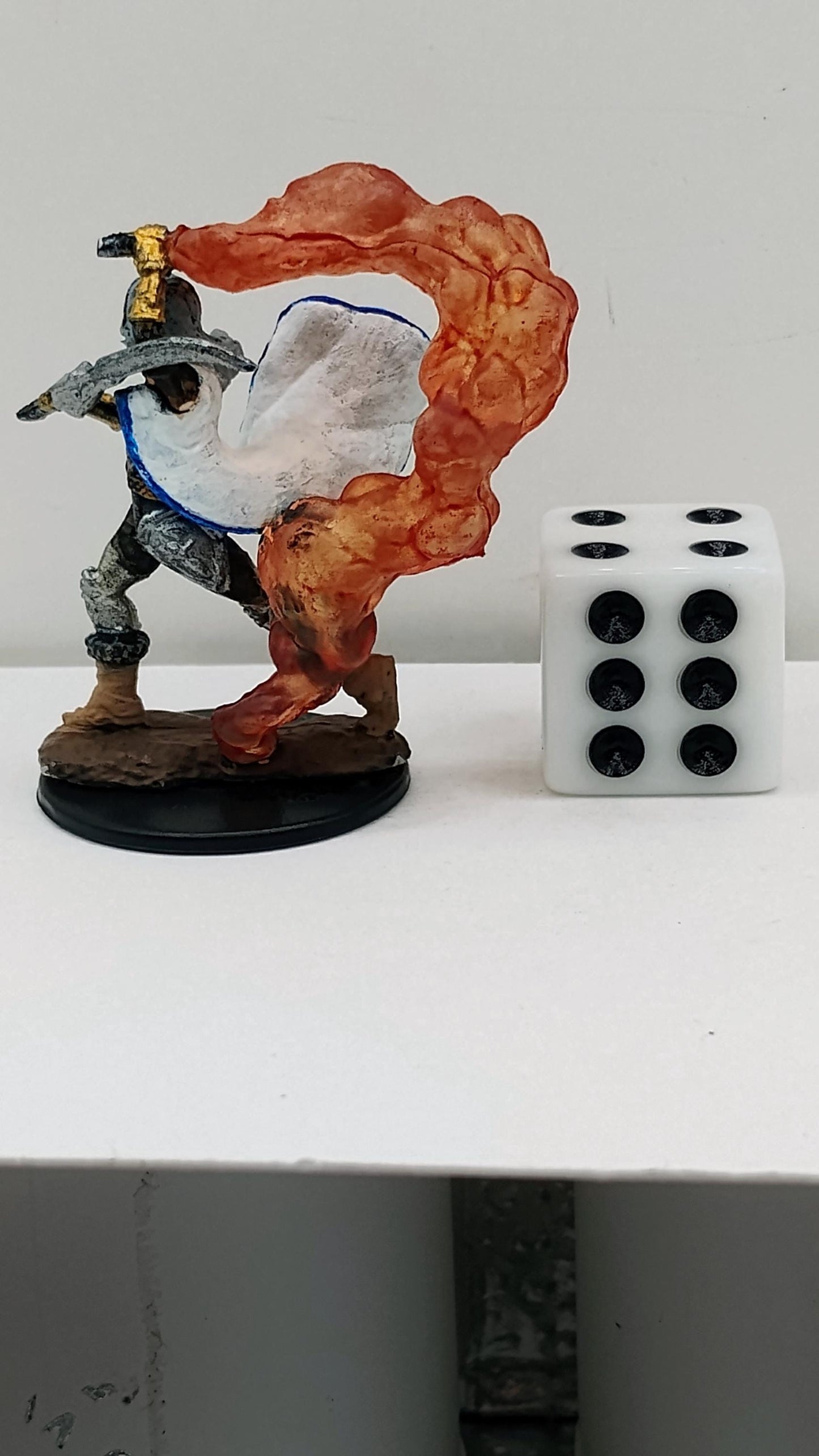 Human Cleric Miniature: Flaming Weapon, Gold Armor