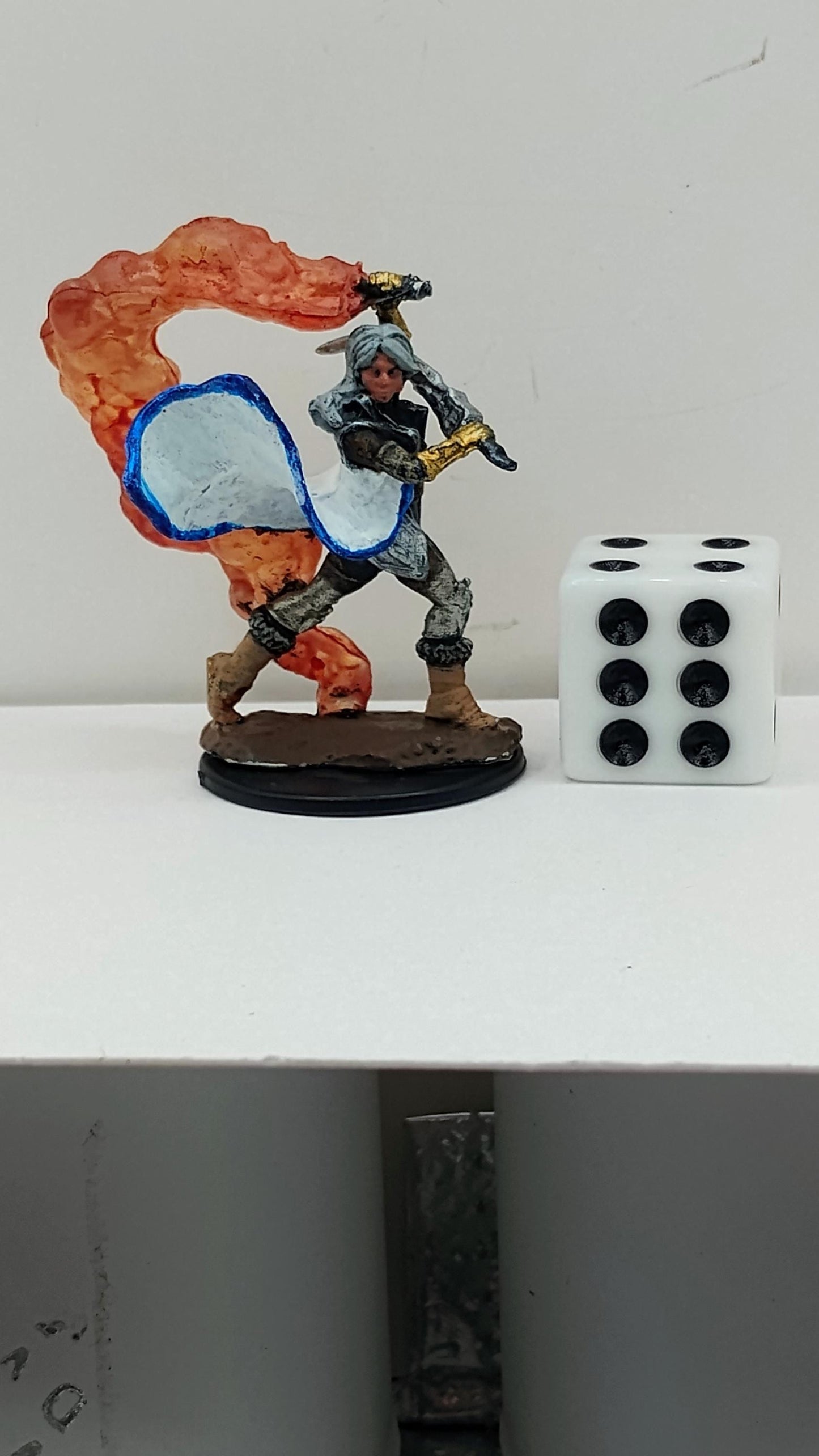 Human Cleric Miniature: Flaming Weapon, Gold Armor