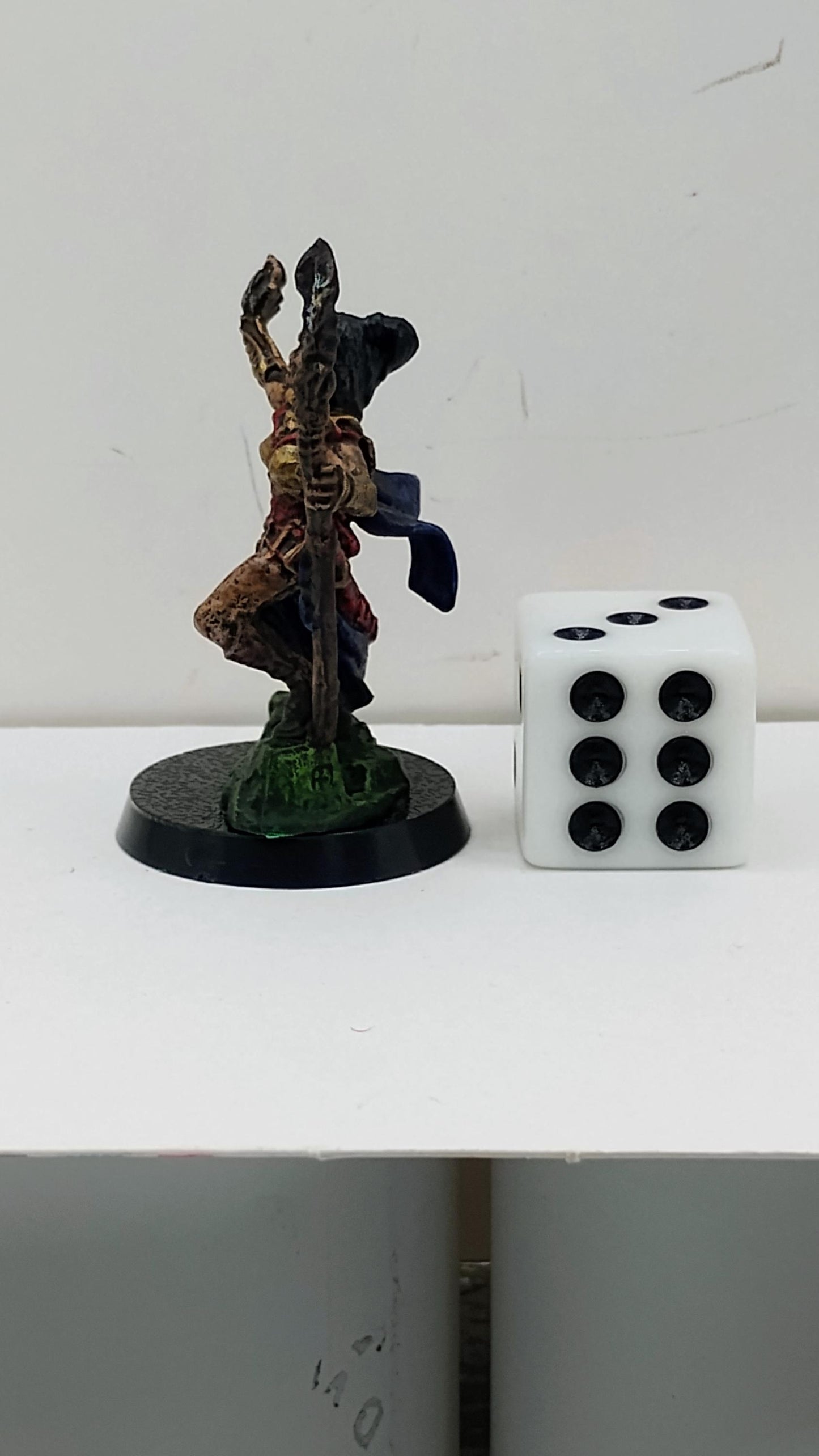 Human Wizard Miniature: Crimson and Gold Arcane Master