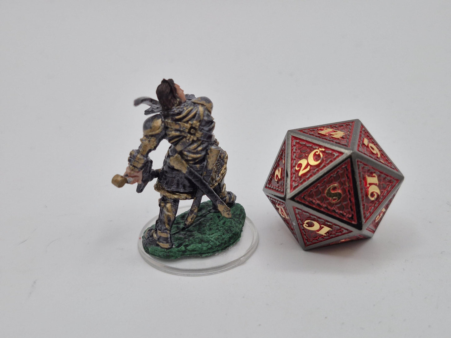 Human Paladin Miniature: Gleaming Gold Armor, Sword Raised