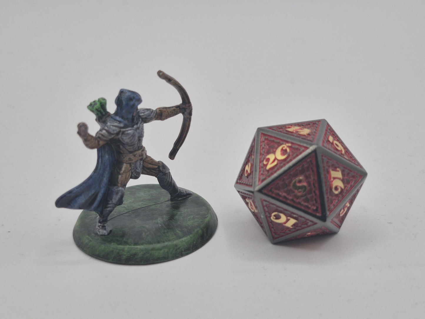 Human Archer Miniature: Gleaming Armor, Green Fletched Arrows