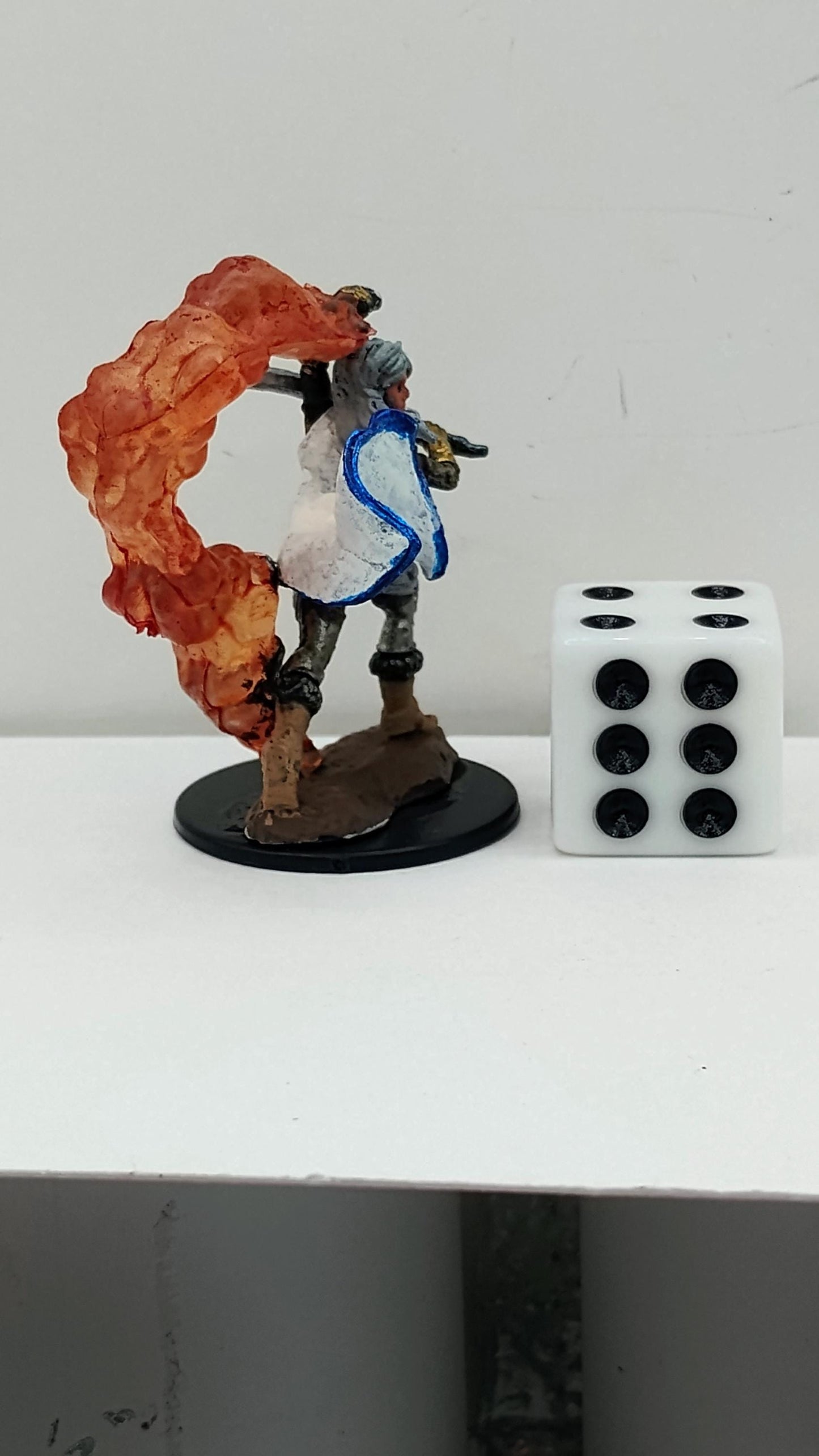 Human Cleric Miniature: Flaming Weapon, Gold Armor