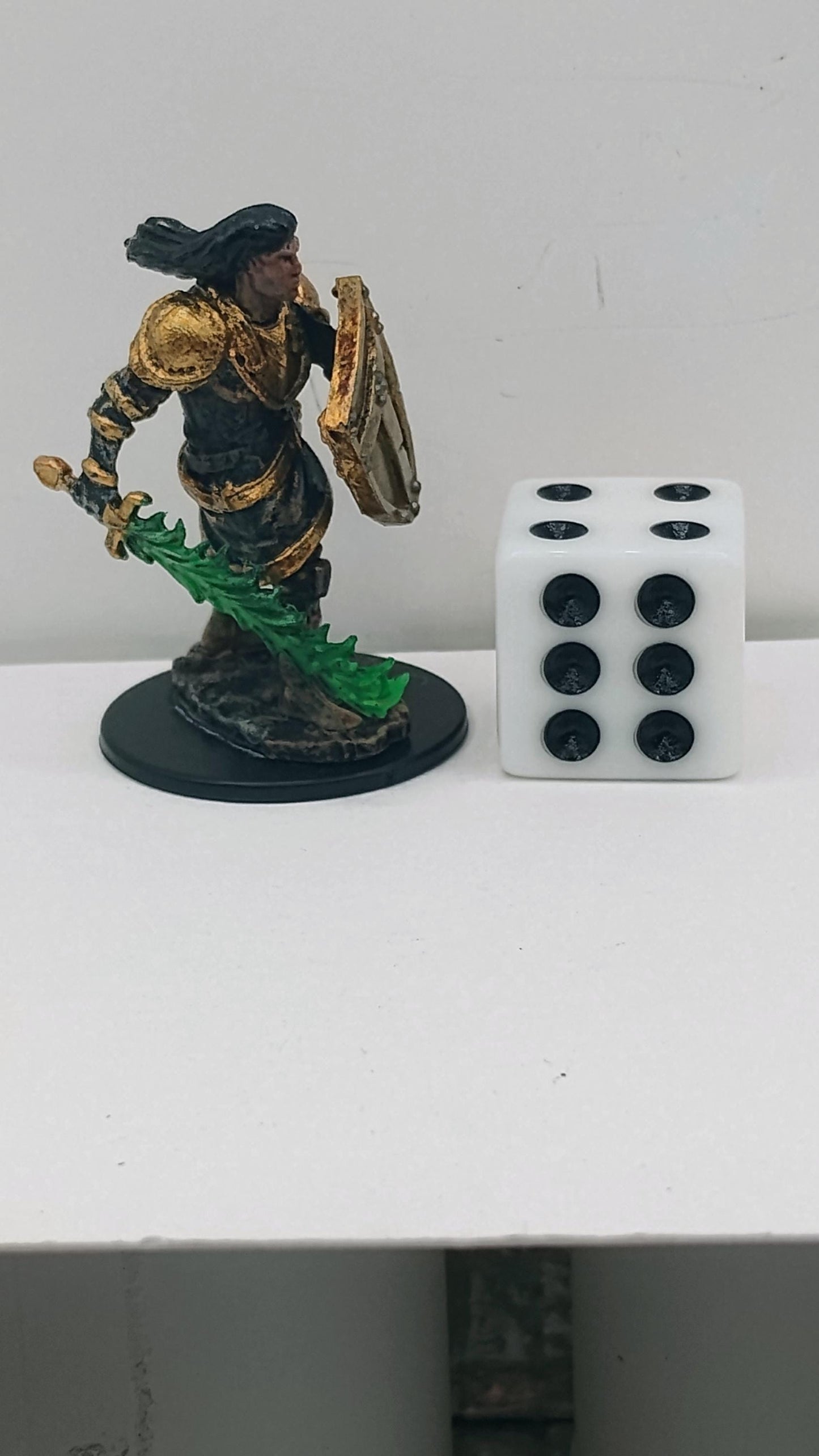 Human Fighter: Golden Armor, Enchanted Green Blade