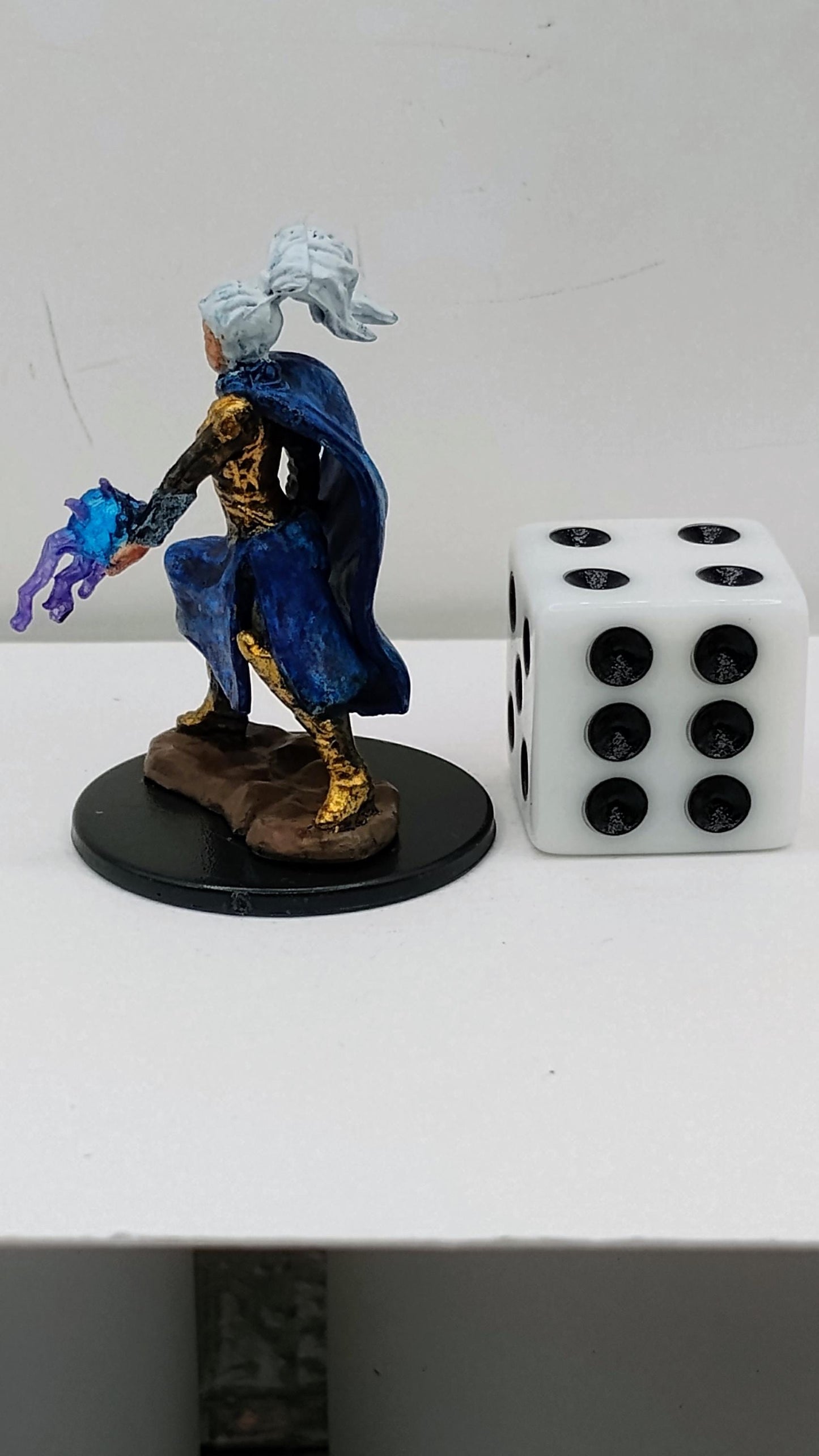 Human Sorcerer: Navy & Gold Armor, Violet Energy