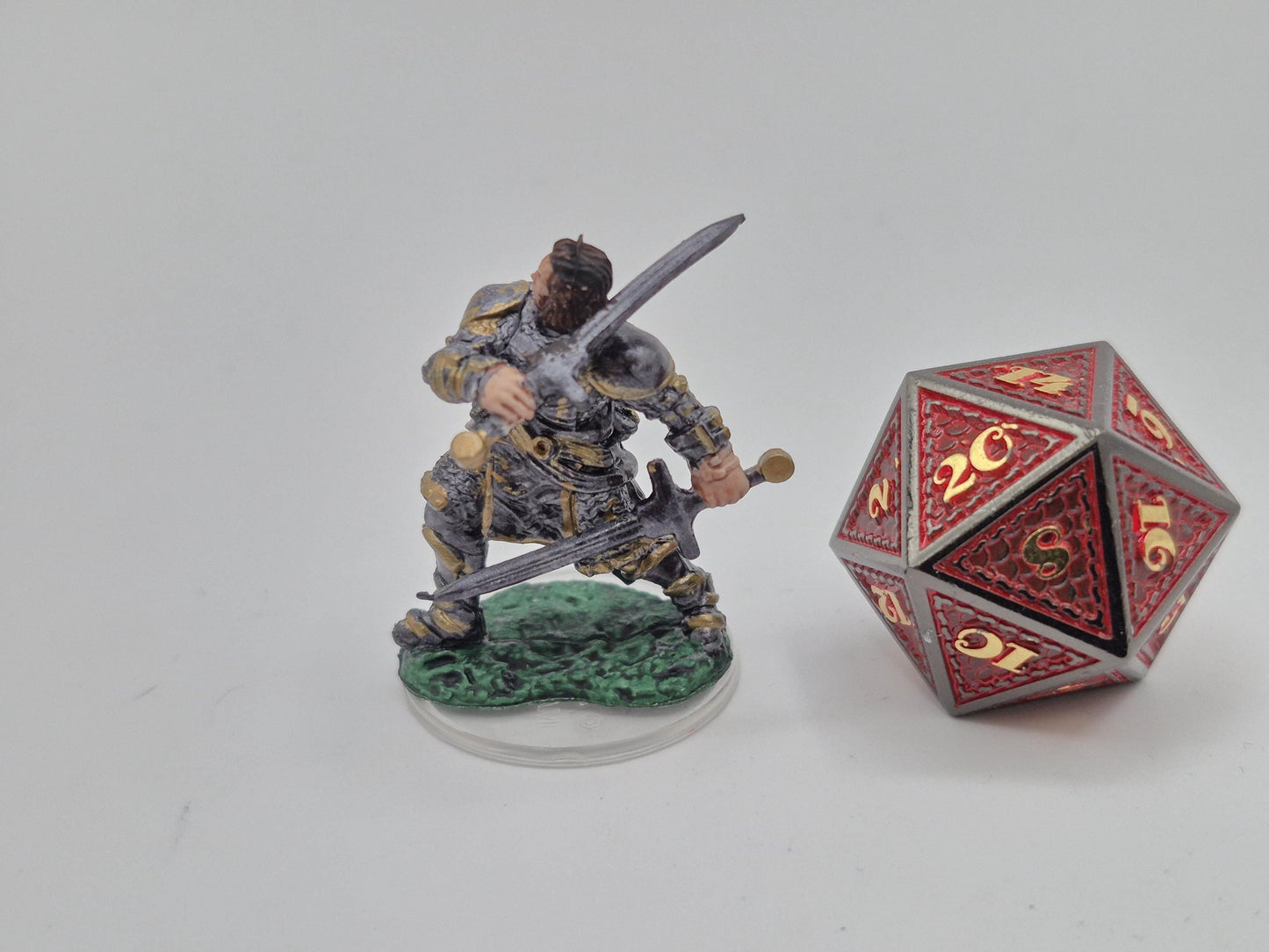 Human Paladin Miniature: Gleaming Gold Armor, Sword Raised