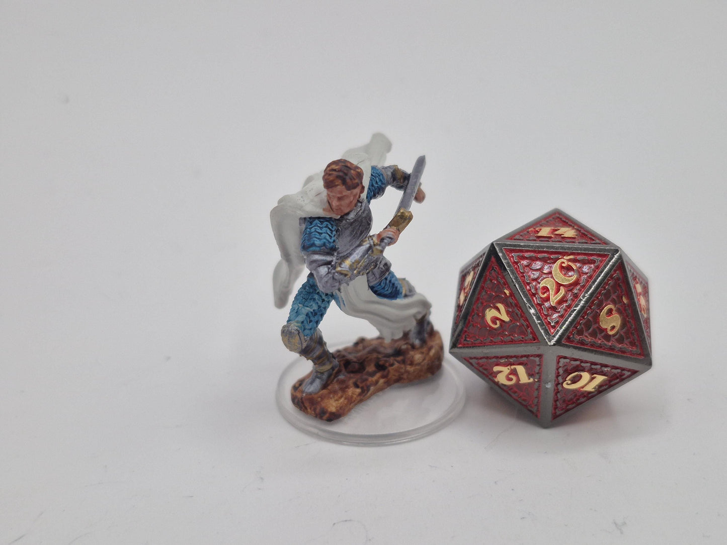 Aasimar Fighter Miniature: Gleaming Silver Armor, Blue Chainmail