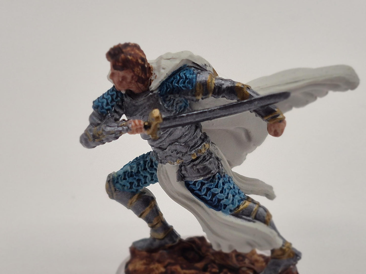 Aasimar Fighter Miniature: Gleaming Silver Armor, Blue Chainmail