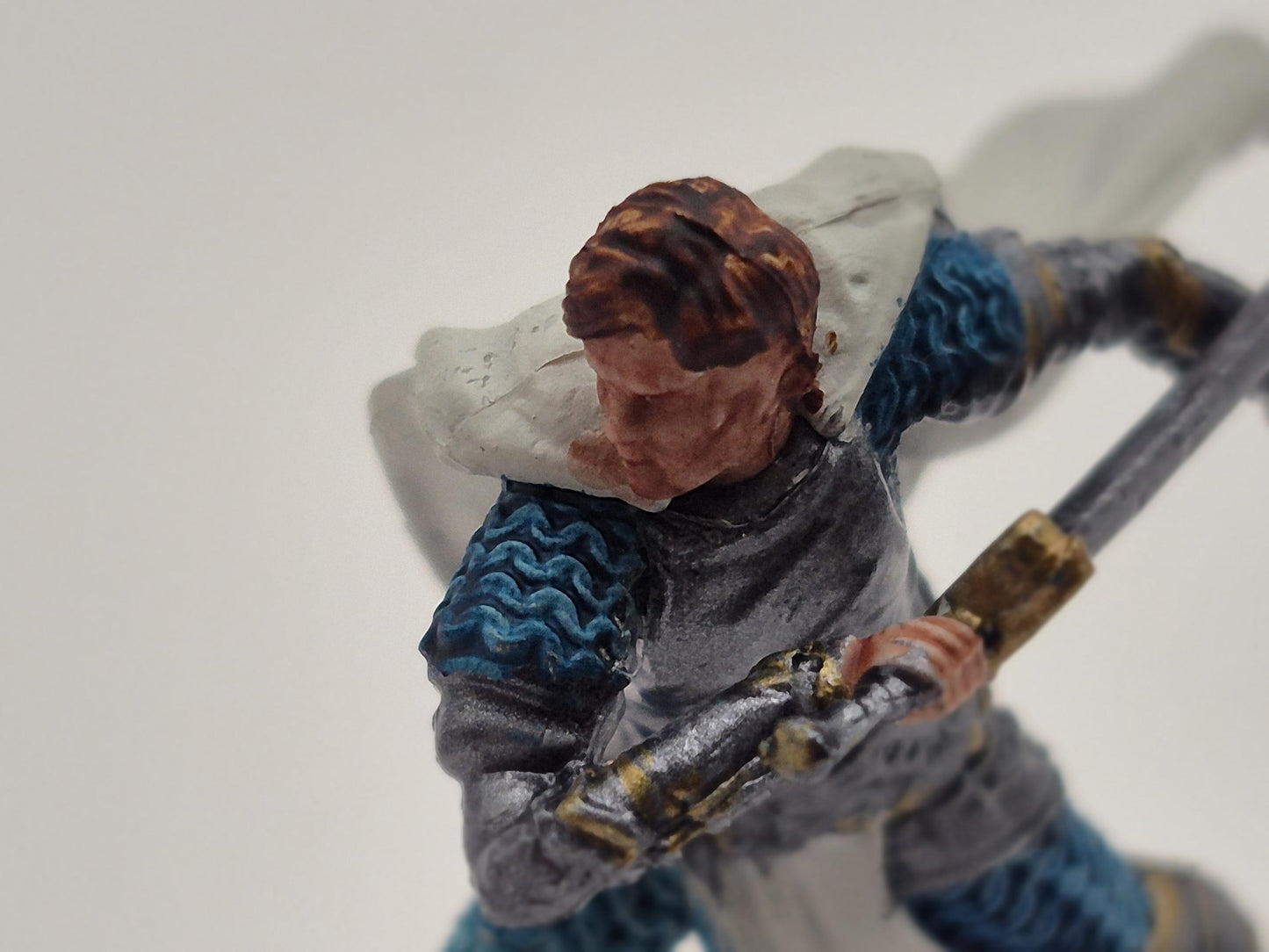 Aasimar Fighter Miniature: Gleaming Silver Armor, Blue Chainmail