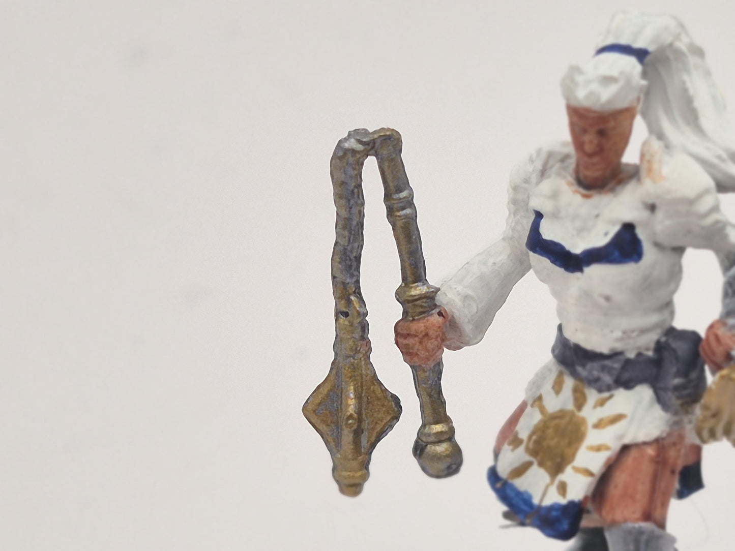 Kalashtar Cleric Miniature: Divine White & Gold
